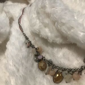 Gold necklace with pink chain. And pearls